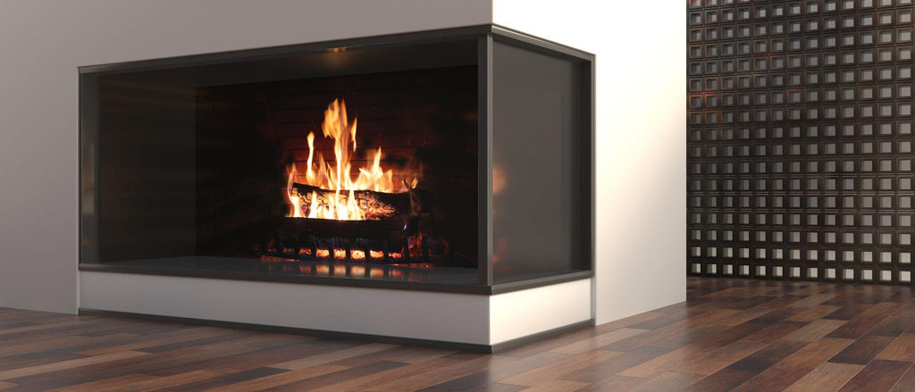 Burning wood in a modern fireplace with a closed combustion chamber standing in the living room