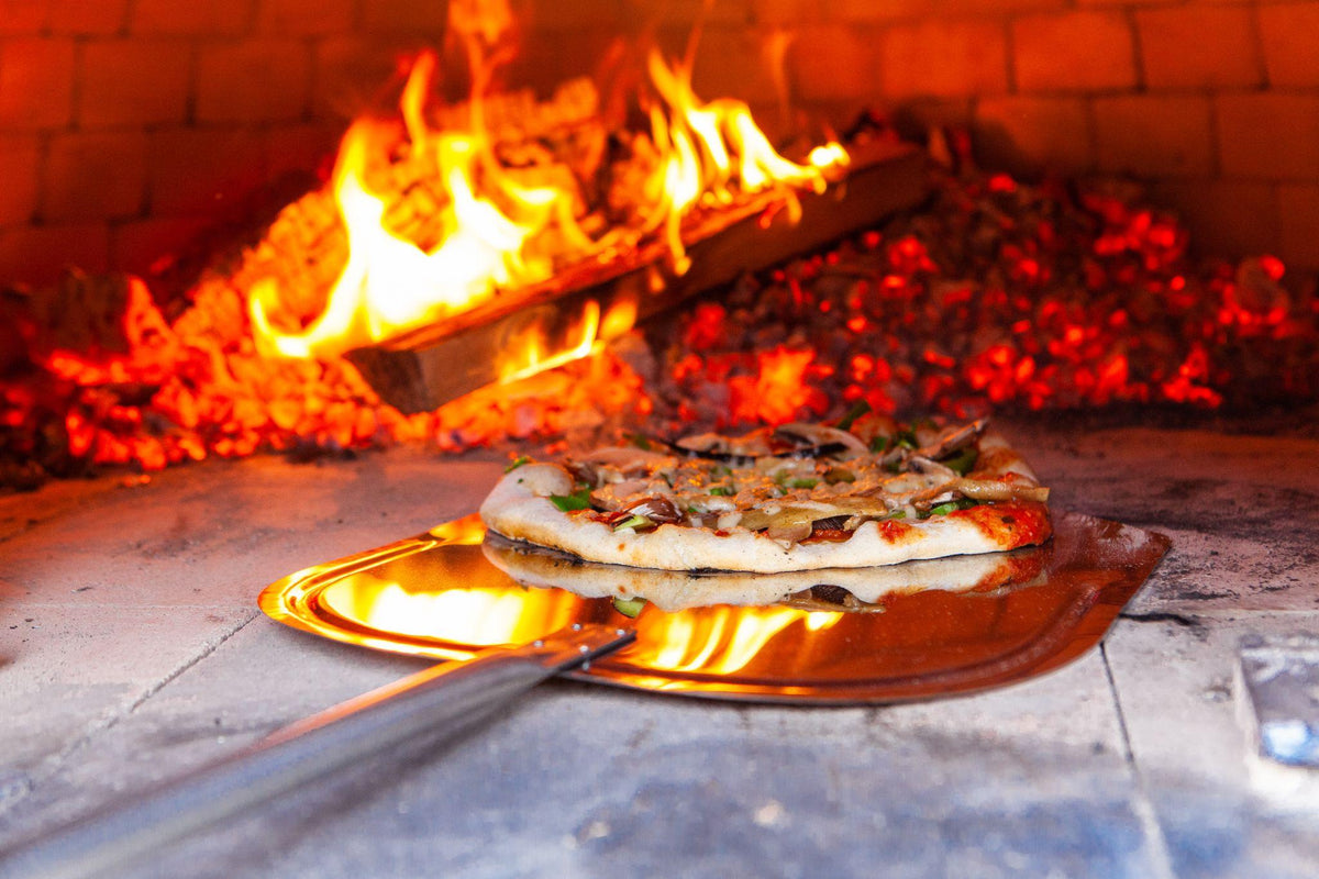 How to Cook Pizza in an Outdoor Pizza Oven & CAPO Fireside